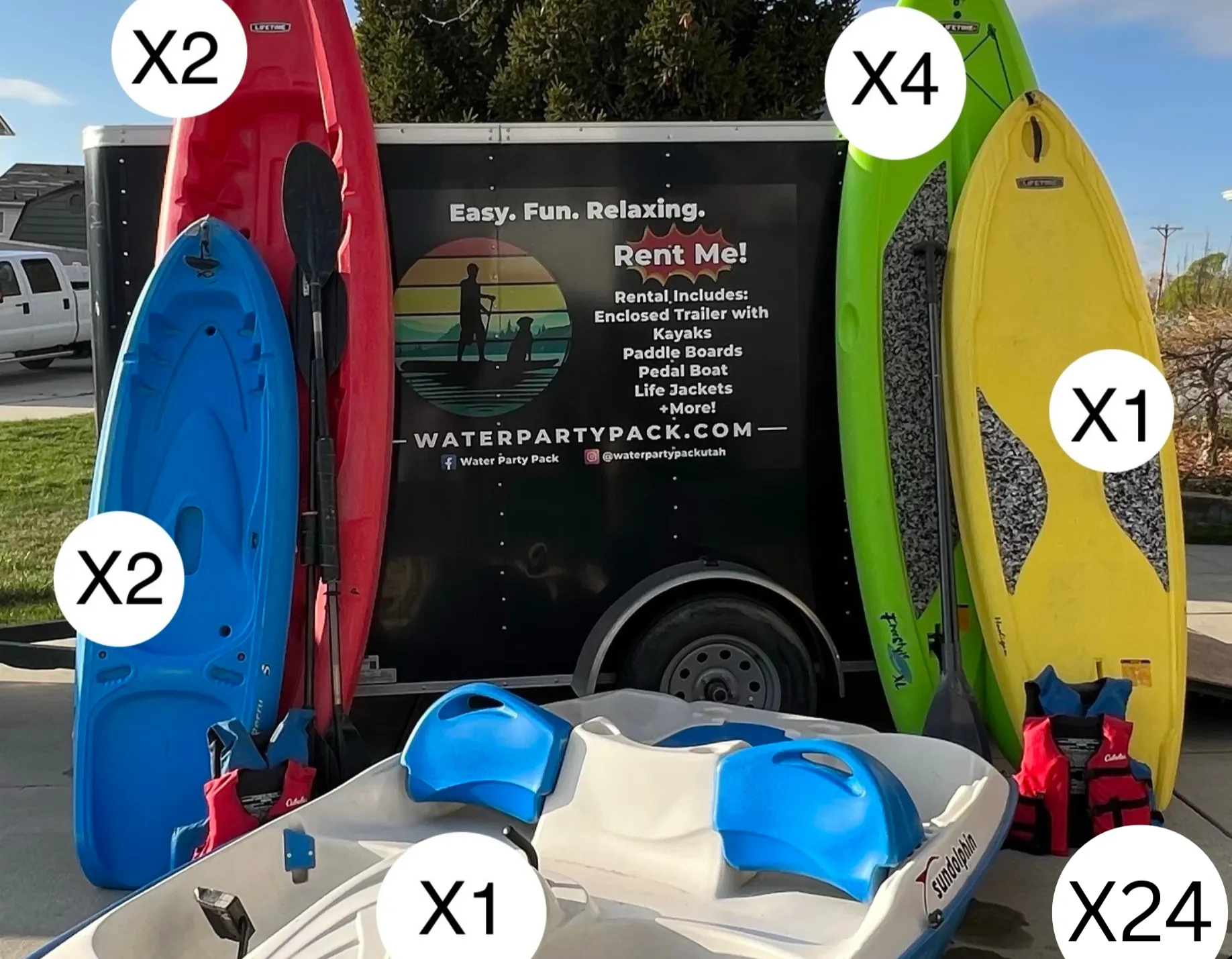 The trailer comes fully loaded with 5 paddleboards, 4 kayaks, and a pedal boat.